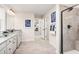 Elegant main bath with double vanity and large shower at 604 Mohinda Way, Willow Springs, NC 27592