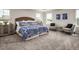 Main bedroom with a king-size bed and plenty of natural light at 604 Mohinda Way, Willow Springs, NC 27592