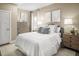 Cozy bedroom with a double bed and wooden dresser at 8913 Stratus St, Willow Springs, NC 27592