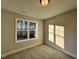 Spacious bedroom with neutral wall colors and large window at 91 Calluna Dr, Clayton, NC 27520
