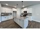 Spacious kitchen featuring granite island and stainless steel appliances at 91 Calluna Dr, Clayton, NC 27520