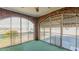 Cozy screened porch with view of the street and yard at 1208 Tucker St, Burlington, NC 27215