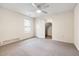 Bedroom with carpeted floor, ceiling fan and closet at 13 Alton Dr, Louisburg, NC 27549