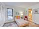 bedroom with twin bed, colorful decor, and adjacent bath at 14 Melstone Turn, Durham, NC 27707