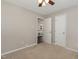 Bright bedroom with ceiling fan and ample closet space at 1619 Milan St, Durham, NC 27704