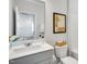 Elegant bathroom with a vanity, toilet, and a framed piece of art at 167 S Finley Landing Pkwy # 80, Smithfield, NC 27577