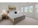 Bright main bedroom with ample natural light and window seat at 2077 Tordelo Pl, Apex, NC 27502