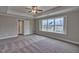 Bright bedroom featuring a large window and ceiling fan at 222 Grand Griffon Way, Lillington, NC 27546