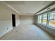 Unfinished bonus room with large windows and natural light at 222 Grand Griffon Way, Lillington, NC 27546