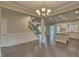 Open concept dining room, kitchen, and living areas at 222 Grand Griffon Way, Lillington, NC 27546