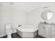 Relaxing bathroom with corner soaking tub and modern vanity at 292 Valley Forge S Way, Cameron, NC 28326