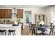 Kitchen and dining area with a round table and four chairs at 310 Umstead St, Sanford, NC 27330