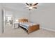 Bright bedroom with a double bed and plenty of natural light at 316 Spruce Pine Trl, Knightdale, NC 27545