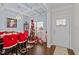 Formal dining area with decorative Christmas tree and hardwood floor at 316 Spruce Pine Trl, Knightdale, NC 27545