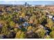 Aerial view of house and surrounding area, showcasing landscape and neighborhood at 3319 Milton Rd, Raleigh, NC 27609