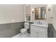 Modern bathroom with gray tile and marble vanity at 3319 Milton Rd, Raleigh, NC 27609