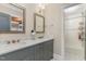 Elegant bathroom with double vanity, marble countertops, and a shower at 3319 Milton Rd, Raleigh, NC 27609