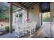 Covered patio with outdoor dining table at 3319 Milton Rd, Raleigh, NC 27609