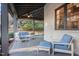 Covered patio with seating and outdoor heater at 3319 Milton Rd, Raleigh, NC 27609