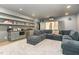 Basement home theater with sectional sofa and projector at 3319 Milton Rd, Raleigh, NC 27609