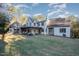 Stunning house exterior with large backyard at 3319 Milton Rd, Raleigh, NC 27609