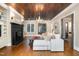 Spacious living room with hardwood floors, fireplace, and built-in shelving at 3319 Milton Rd, Raleigh, NC 27609