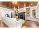 Living room features hardwood floors, built-in shelving, and a fireplace at 3319 Milton Rd, Raleigh, NC 27609