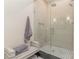 Large walk-in shower with gray tile and glass enclosure at 3319 Milton Rd, Raleigh, NC 27609