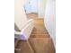 Carpeted staircase leading from the upper to lower level at 3540 Midway Island Ct Ct, Raleigh, NC 27610