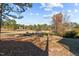 View of a backyard with a golf course in the distance at 419 Carolina Way, Sanford, NC 27332