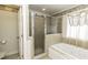 Spa-like bathroom with soaking tub and shower at 4633 Lily Walk, Rocky Mount, NC 27804