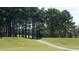 Well-manicured path meanders through the golf course at 510 Village Branch Ln # 45, Wake Forest, NC 27587