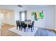 Elegant dining room features hardwood floors and modern light fixture at 513 Fife Ct, Gibsonville, NC 27249