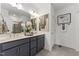Elegant bathroom with dual vanity and upgraded fixtures at 604 Market Grove Dr # 100, Wake Forest, NC 27587