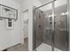 Modern bathroom with a large walk-in shower and tiled floors at 604 Market Grove Dr # 100, Wake Forest, NC 27587