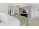 Spacious bedroom with large windows and plush bedding at 604 Market Grove Dr # 100, Wake Forest, NC 27587
