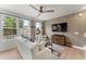 Spacious living area with large windows, hardwood floors, and a cozy atmosphere at 604 Market Grove Dr # 100, Wake Forest, NC 27587