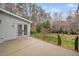 Spacious back patio with access to a wooded backyard at 624 Great Pine Way, Raleigh, NC 27614