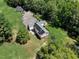 Aerial view of house, yard, and surrounding golf course at 76 & 77 Traceway N, Sanford, NC 27332