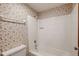 Small bathroom with floral wallpaper and bathtub at 76 & 77 Traceway N, Sanford, NC 27332