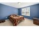 Cozy bedroom with a double bed and plenty of natural light at 78 N Porcenna Ln, Clayton, NC 27527