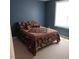 Spacious bedroom with large window and carpet flooring at 78 N Porcenna Ln, Clayton, NC 27527