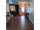 Bright entryway with hardwood floors and view to dining room at 78 N Porcenna Ln, Clayton, NC 27527