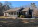 House exterior with a front porch and walkway at 8067 Nc Hwy 96, Oxford, NC 27565