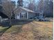 Side view of house with landscaping at 8067 Nc Hwy 96, Oxford, NC 27565