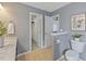 Bathroom features a toilet, vanity, and access to a closet at 900 Blue Thorn Drive Dr, Apex, NC 27539