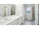 Modern bathroom with double vanity and large walk-in shower at 1001 Rose Finch Dr, Durham, NC 27703