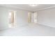 Bright bedroom with carpeted floor and ensuite bathroom access at 1001 Rose Finch Dr, Durham, NC 27703