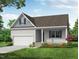 One-story house with gray siding, a white garage door, and landscaping at 114 Arundel Dr, Archer Lodge, NC 27527