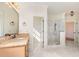 Spa-like bathroom with marble shower and vanity at 15 Treviso Pl, Durham, NC 27707